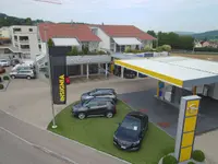 Touring Garage & Carrosserie Baur AG