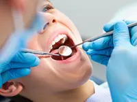 Dr. med. & med. dent  Raphael Perren