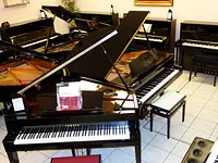 Centre Schmidt Pianos – Cliquez pour agrandir l’image 1 dans une Lightbox