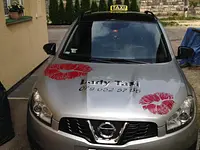 Lady-Taxi – Cliquez pour agrandir l’image 1 dans une Lightbox