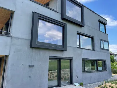 Neubau in Zollikofen, Holzmetallfenster und Hebeschieber, 2021