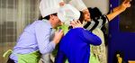 Swing the wooden spoon together as a team