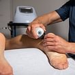 Stosswellentherapie für Beschwerden der Achillessehne