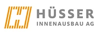 Hüsser Innenausbau AG-Logo