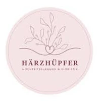 Härzhüpfer Hochzeitsplanung & Floristik Stefanie Wymann-Logo
