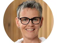 Hörhilfe Zug AG, Monica De Carli