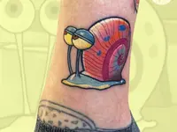 Raketenwacholder Tattoo und Piercing