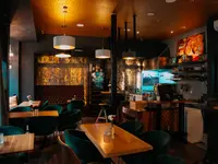 Cue Café Restaurant & Lounge Bar