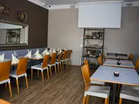 Pizzeria & Café Dorfplatz AG