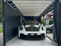 Veluxio – Geschlossener Autotransport Schweiz & Europa