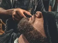 Adam Barbershop Coiffeur, Inhaber Khaled
