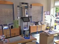 Schürz Brillen & Kontaktlinsen