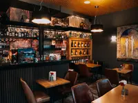 Cue Café Restaurant & Lounge Bar