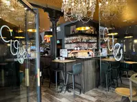 Cue Café Restaurant & Lounge Bar